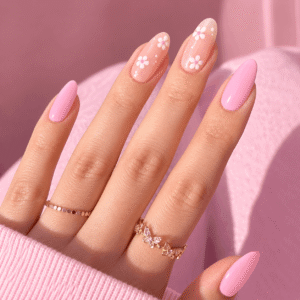 Glossy pink gel nails with delicate floral nail art